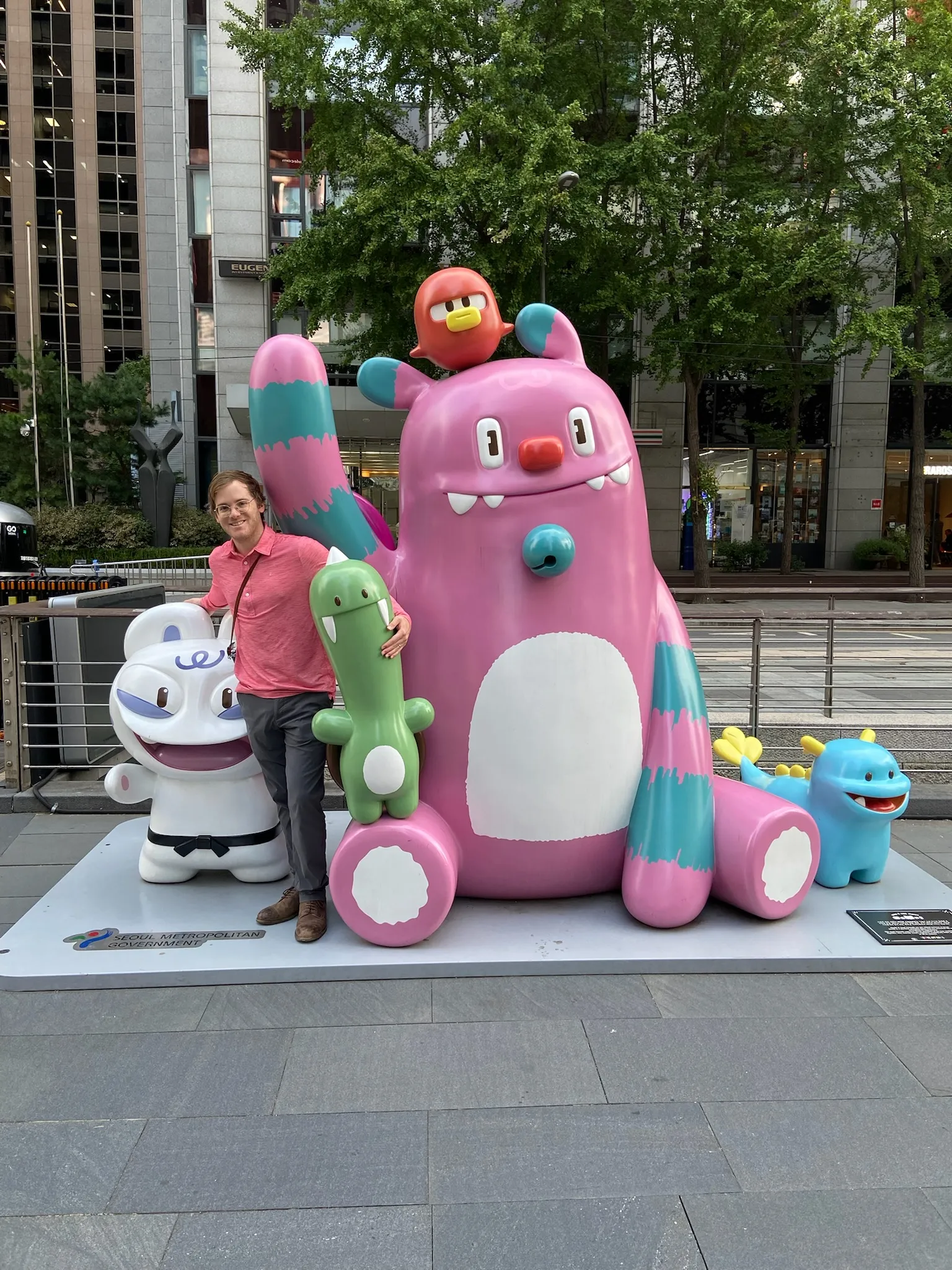 Posing with playful street sculptures in Seoul