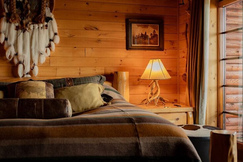 A warm timber-walled room at Hotel Ranga