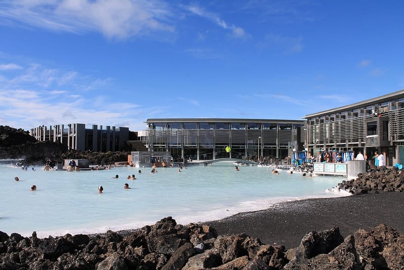 The milky-blue geothermal water and low buildings at the Blue Lagoon