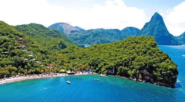 Aerial of Anse Chastanet's cove and reef below the Pitons