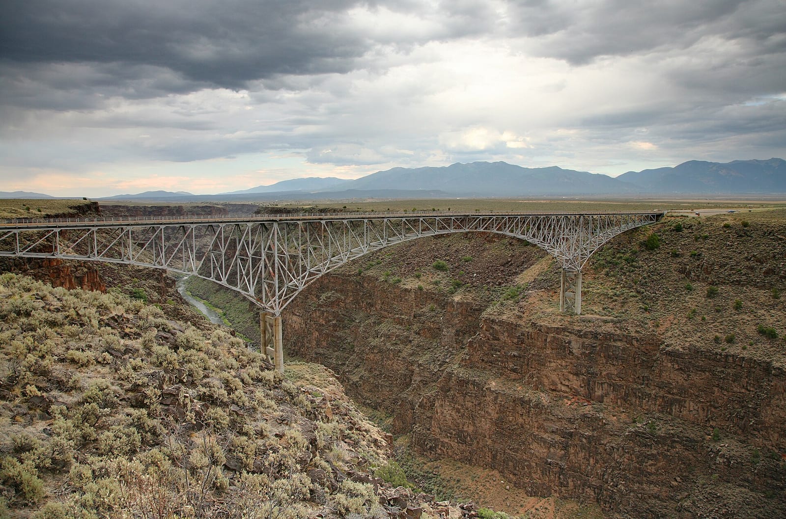 The steel Rio Grande Gorge Bridge spanning a deep basalt canyon northwest of Taos